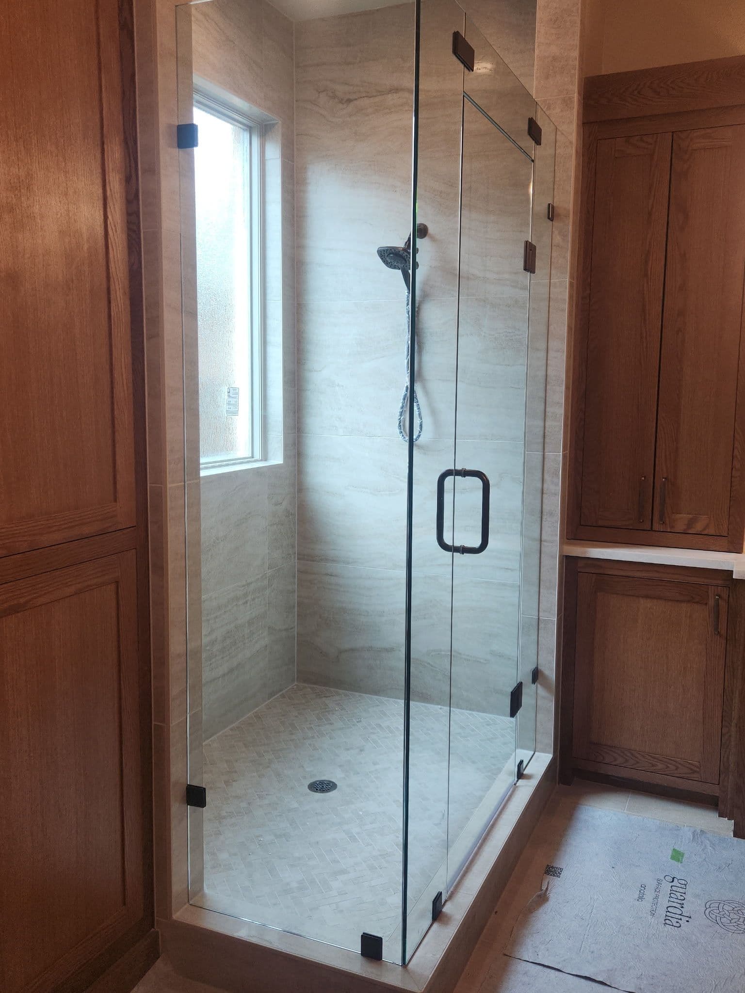 Sleek Bathroom Upgrade with Frameless Shower Doors image