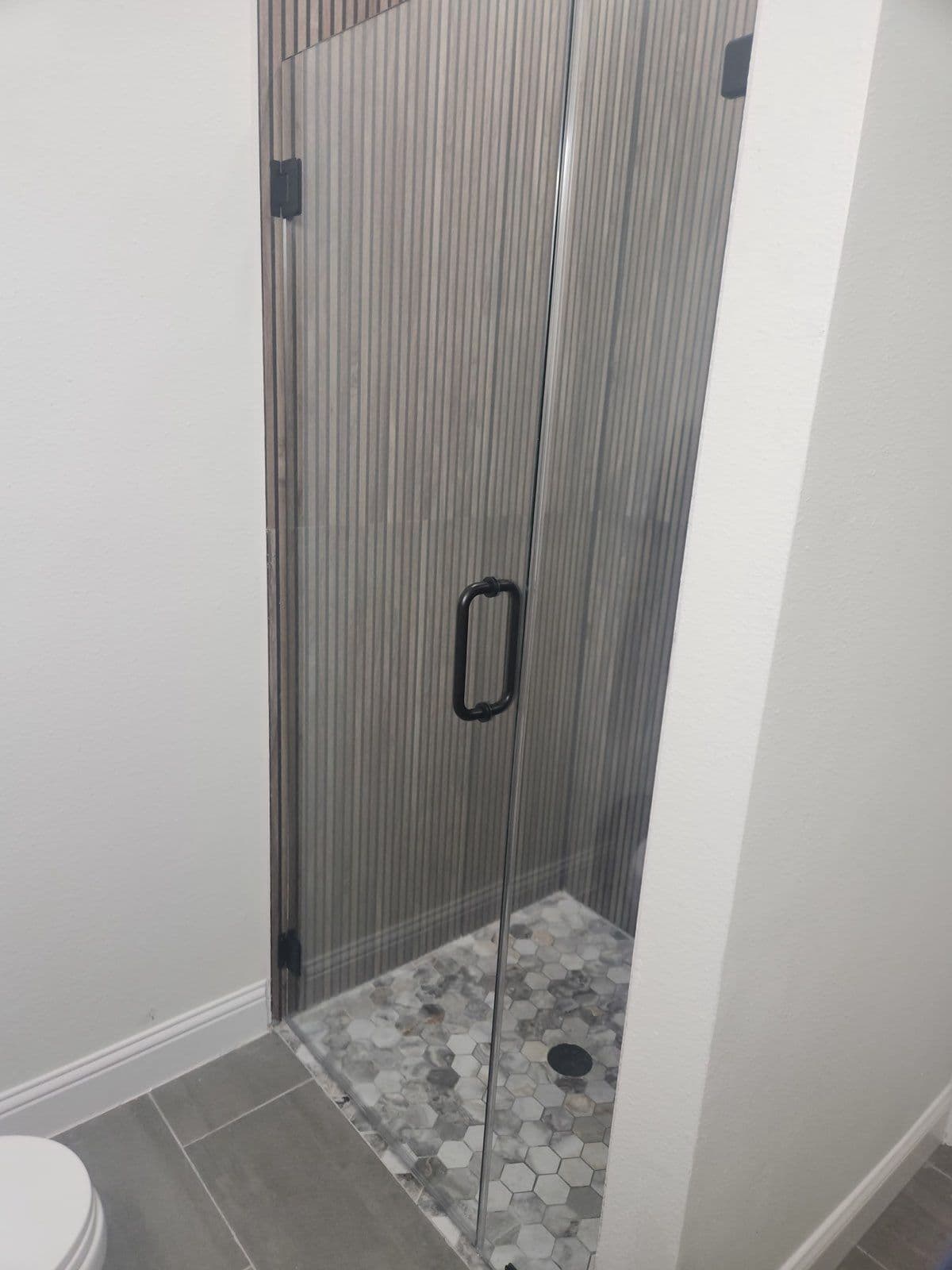 Sleek Glass Doors and Modern Shower Installation