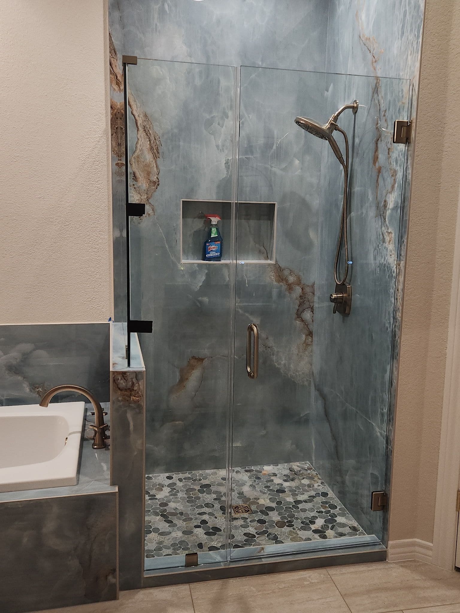 Project Luxurious Bathroom Upgrade with Frameless Glass Doors image