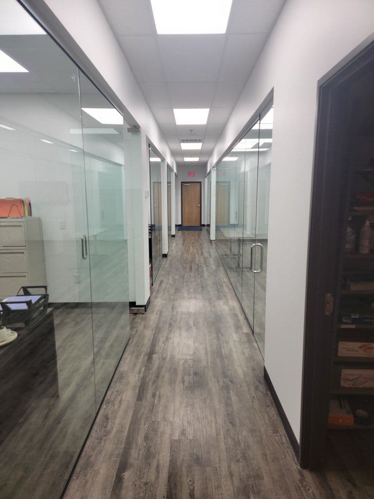 Modern Office Transformation with Sleek Glass Installations image